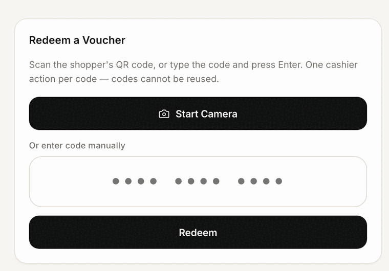 Merchant scan and redeem screen: start camera or type a voucher code